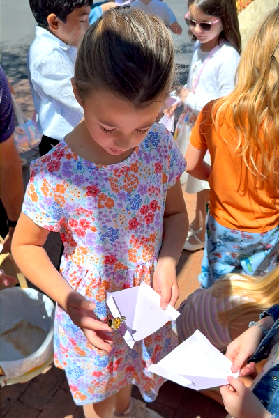 Children taking part in a parish activity outdoors.